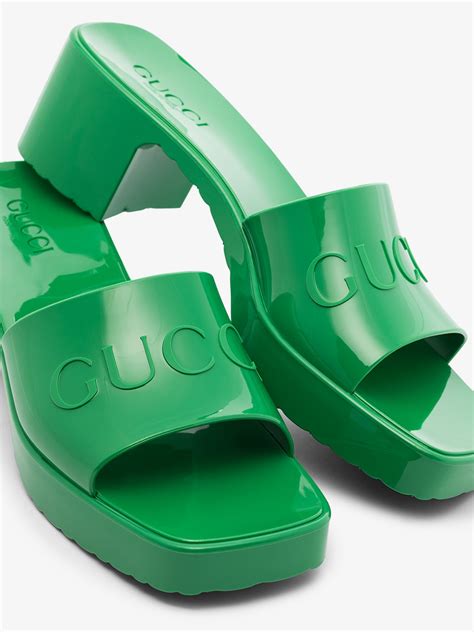 green rubber gucci slides